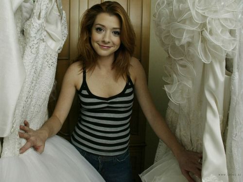 Alyson hannigan surrounded by wedding dresses 8x10 picture celebrity print