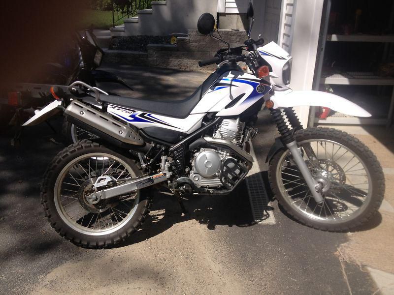 2012 yahama xt250 dualsport, 1169 mi, title in hand, warranty-price just lowered