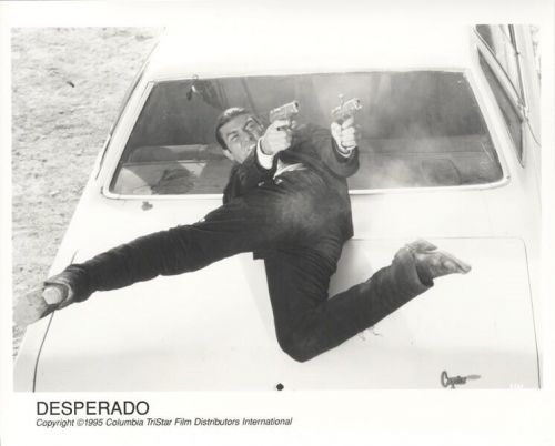 Antonio banderas firing guns in action desperado 1995 original 8x10 photo